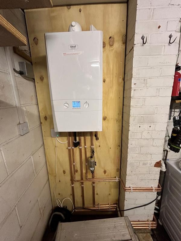 Wall-mounted boiler installation