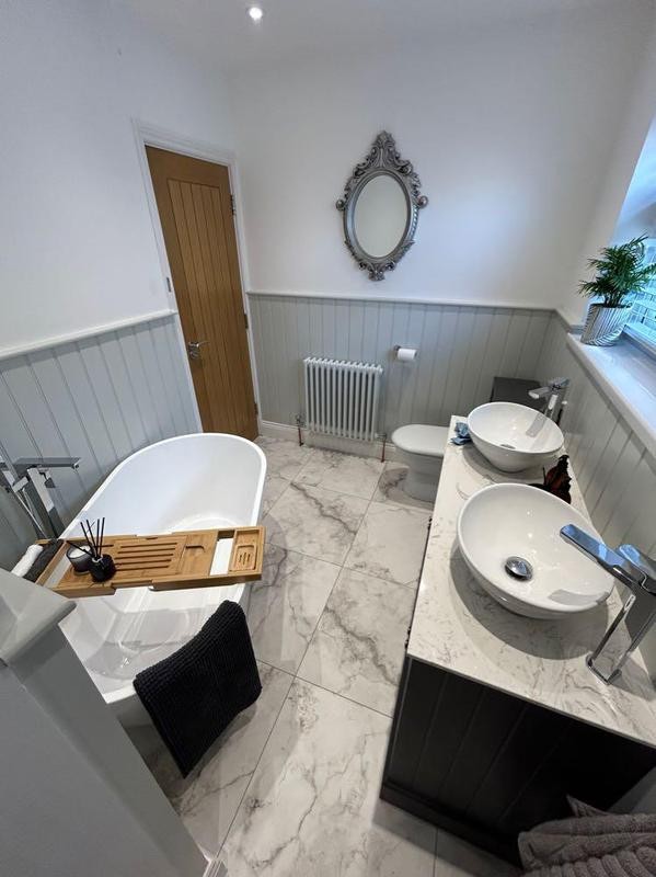 Bath and bathroom vanity
